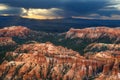 A dramatic sky shoots rays of Sun on Bryce Canyon National Park.